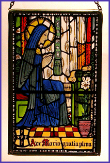 Detail from a stained glass window at the Shrine of Our Lady  of  Walsingham